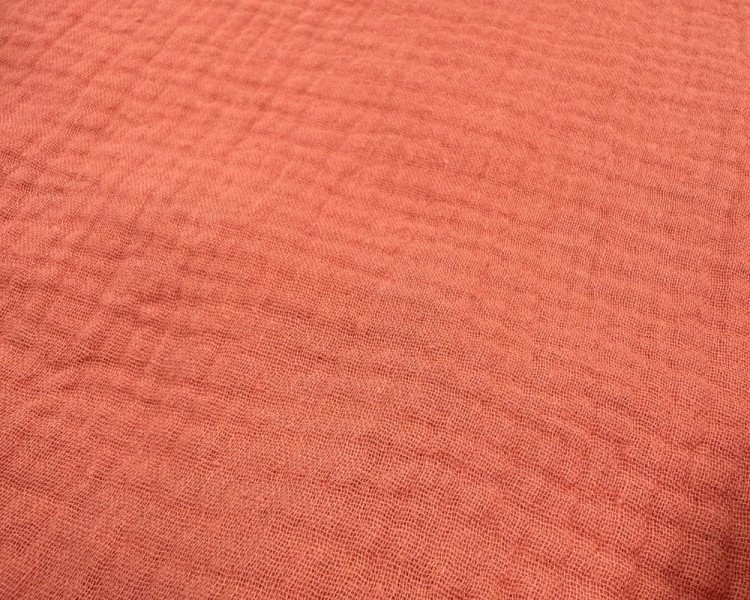 Prześcieradło-muślinowe-z gumką-do-dostawki-90x50-brzoskwiniowe-pomarańczowe-zbliżenie