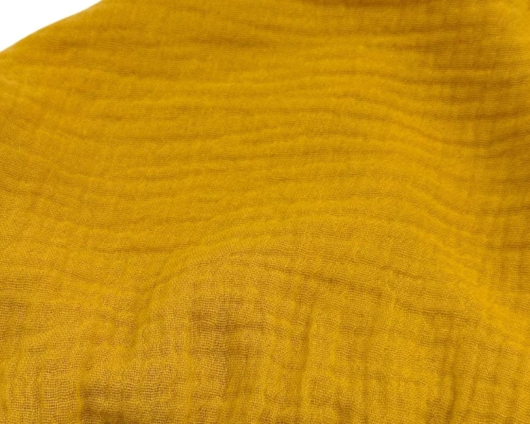 Prześcieradło-z-gumką-do-łóżeczka-dziecięcego-120x60-musztardowe-żółte-materiał