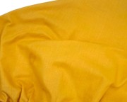 Prześcieradło-bawełniane-dziecięce-z-gumką-140x70-żółte-mango-materiał