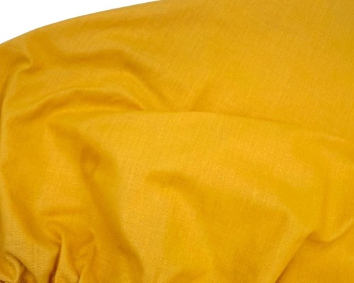 Prześcieradło-bawełniane-dziecięce-z-gumką-140x70-żółte-mango-materiał