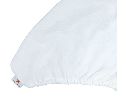 Białe prześcieradło muślinowe z gumką do łóżeczka dziecięcego 120x60